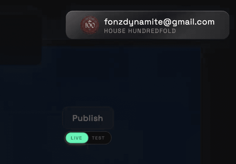 The top-right corner of the dashboard once signed in: a plan crest beside the account's email address, with House Hundredfold below it.